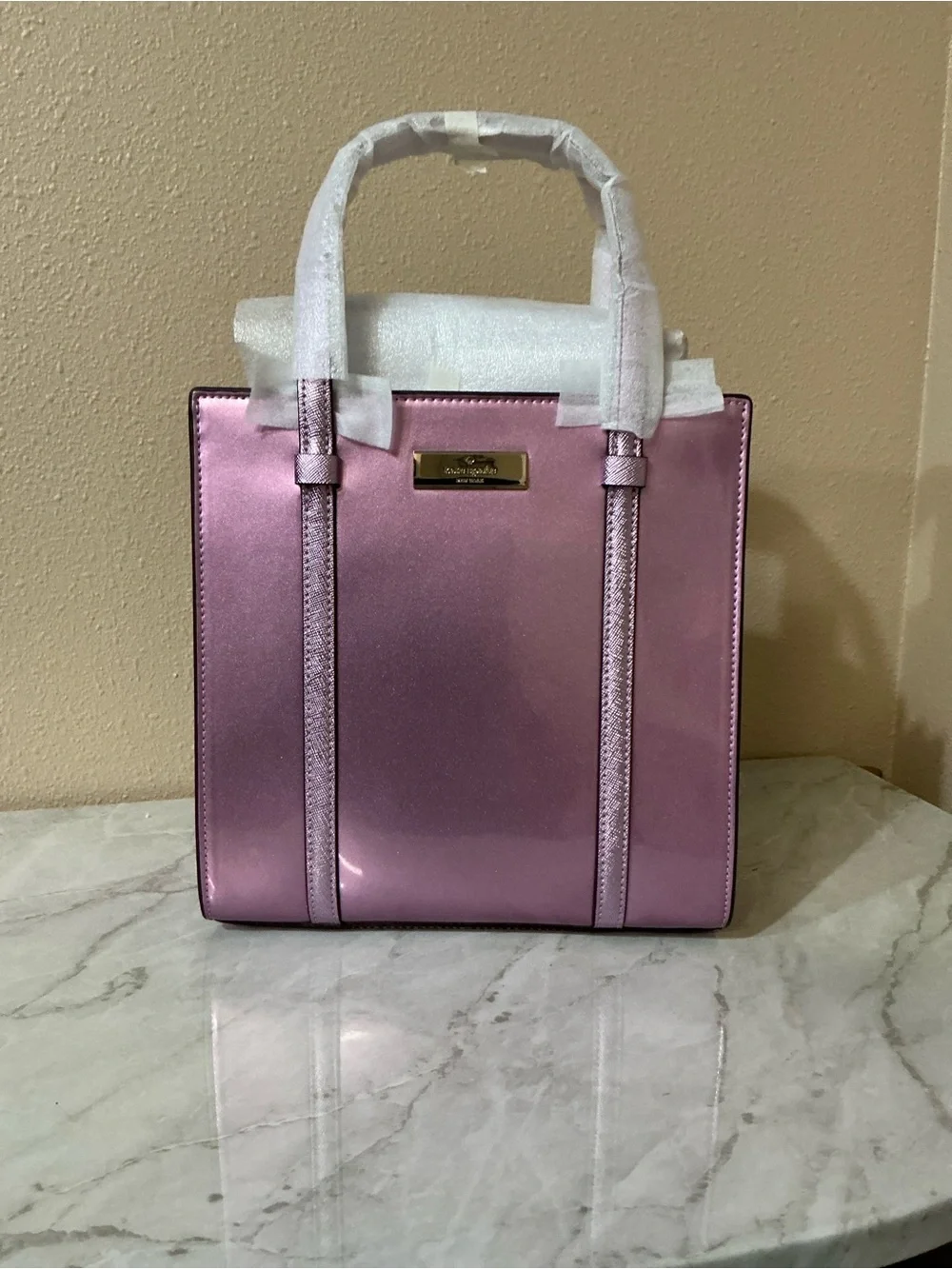 Kate Spade Mini Tote Metallic Quartz Pink.